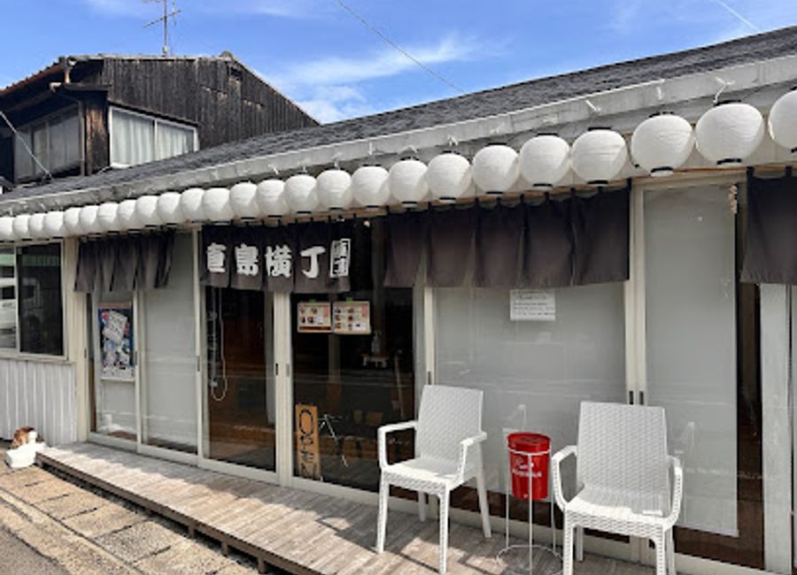 Experience authentic Japanese cuisine at Naoshima Yokocho, an izakaya that captures the essence of Naoshima's culinary culture amidst stunning art and nature.