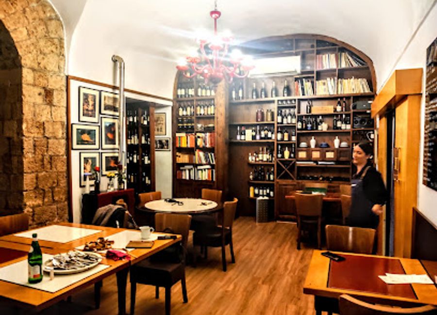 Experience the charm of Italian wine culture at Viva Lo Re, a cozy wine bar in Ercolano, offering exquisite wines and delightful bites.