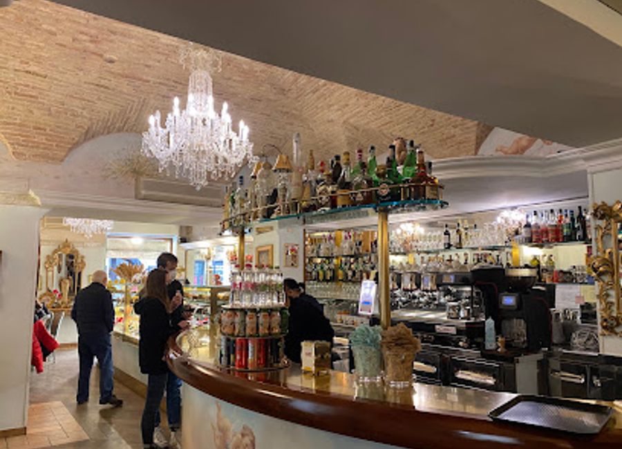 Experience the elegance of Italian café culture at Gran Caffè in Assisi, where premium coffee and exquisite pastries await.