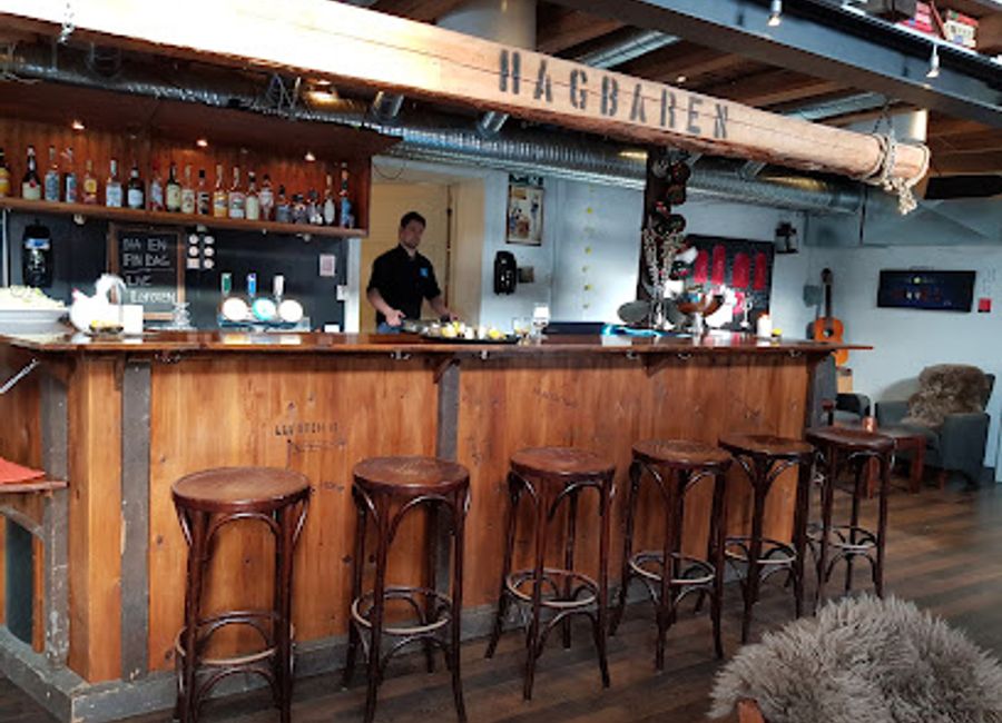 Discover the vibrant atmosphere of Live Lofoten Pub in Stamsund, a cultural hub for enjoying local brews and connecting with fellow travelers.