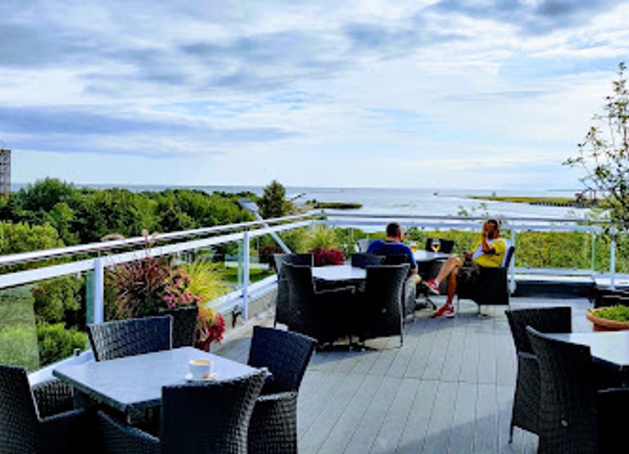 Discover the lively atmosphere of Muuli Bar in Pärnu, Estonia, where local craft beers and cocktails bring people together in a vibrant nightlife setting.