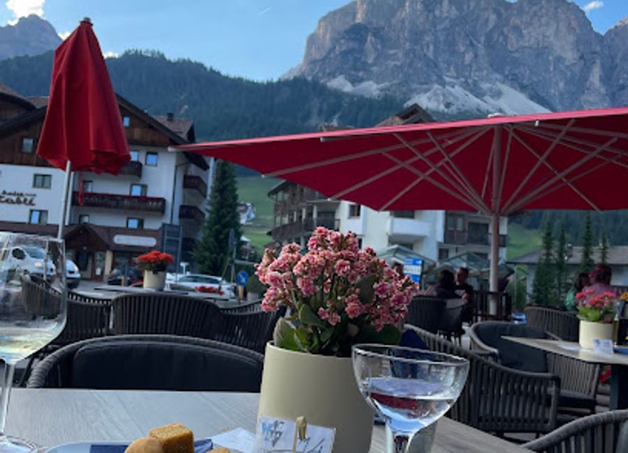 Experience unforgettable cocktails and stunning Dolomite views at Iceberg Bar Restaurant Lounge in Corvara in Badia.