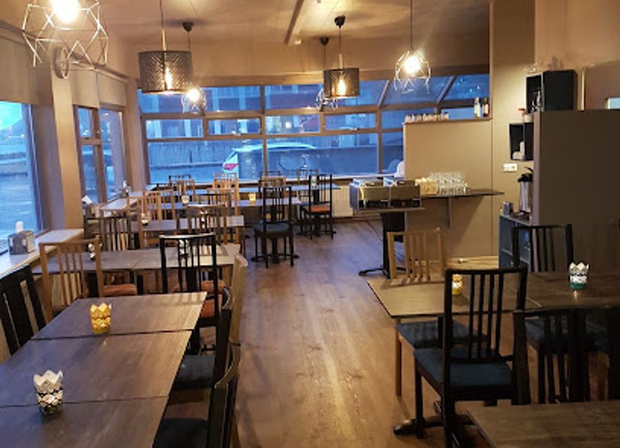 Experience the authentic flavors of Iceland at Vestur Restaurant in Patreksfjörður, a perfect blend of local cuisine and welcoming atmosphere.