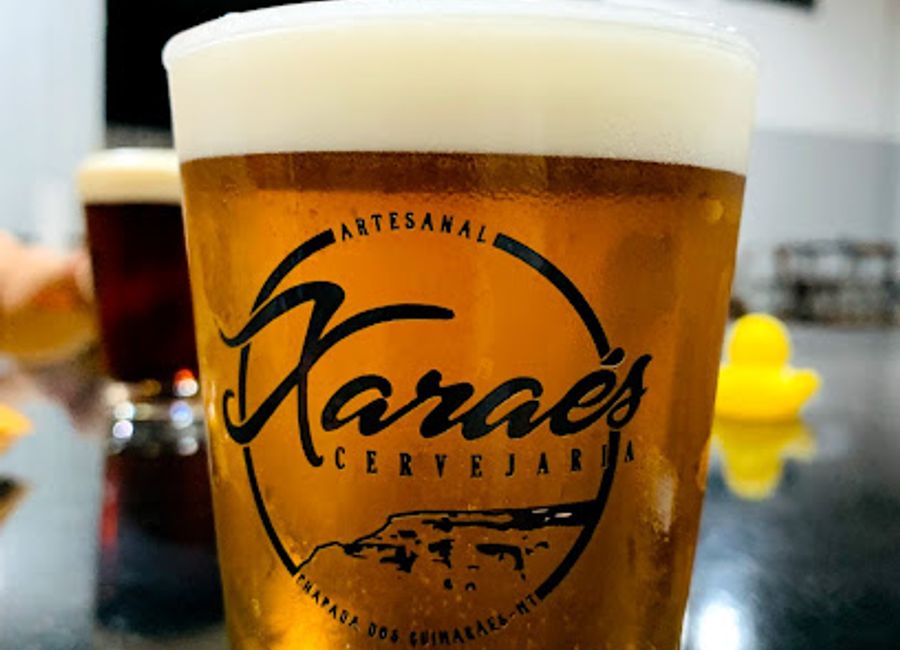 Experience the best of local craft beers at Cervejaria Xaraés, a vibrant brewpub nestled in Chapada dos Guimarães' breathtaking landscapes.