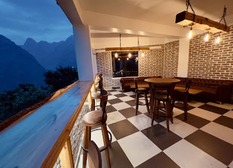 Experience the vibrant nightlife of Joshimath at The Bourbon Club N Lounge, where exquisite drinks and stunning views come together.