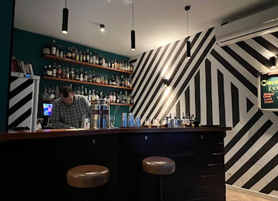 Discover the exquisite cocktails and vibrant atmosphere of Maldito Cocktail Bar in Seville's historic Casco Antiguo district.