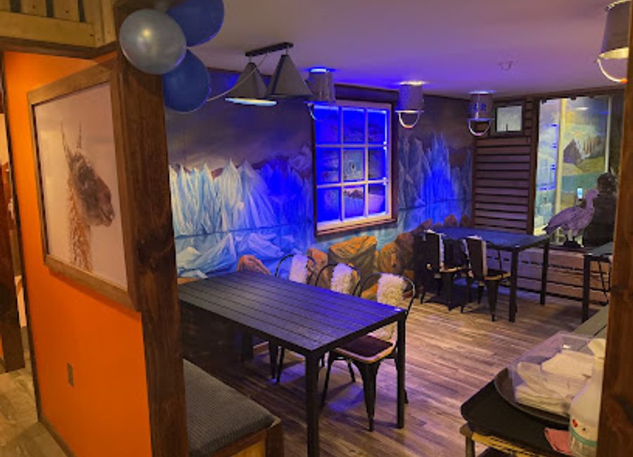 Discover the breathtaking Ice Bar Natales, where cocktails are crafted in a stunning ice environment that showcases the beauty of Patagonia.