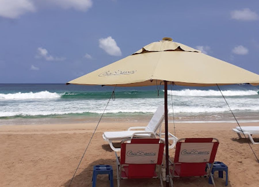 Experience the laid-back charm of Cacimba Lounge Bar in Fernando de Noronha, where tropical drinks and stunning beach views await.