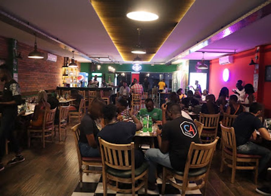 Experience the vibrant atmosphere and delicious grilled dishes at OSHey Bar & Chops, a must-visit culinary hotspot in Lagos.