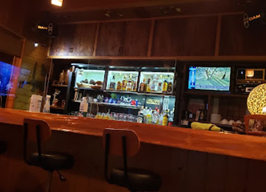 Discover Ganta, a lively bar in Yakushima offering local spirits and a warm atmosphere, perfect for unwinding after a day of adventure.