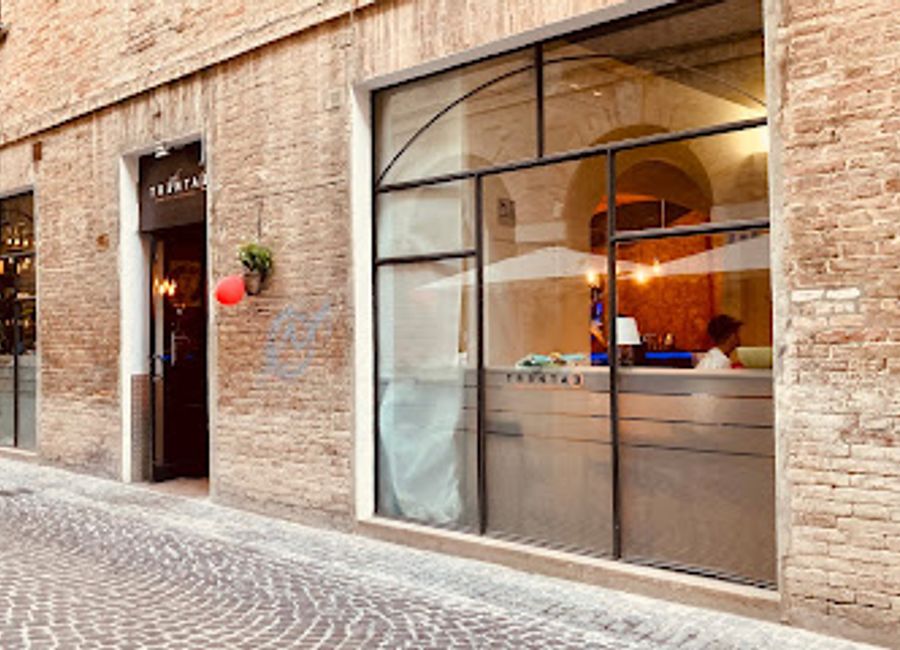 Experience the vibrant atmosphere and delightful drinks at Cafe’ Trentatre’, a must-visit bar in the heart of Urbino, Italy.