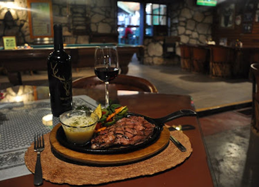 Discover the vibrant spirit of Mexico at La Taberna Del Abuelo in Creel – a local bar serving authentic drinks in a warm atmosphere.