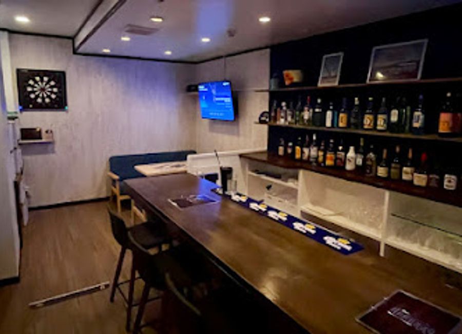 Discover vibrant nightlife at Bar AZZURRO in Ishigaki, where refreshing drinks and a friendly atmosphere await in the heart of Okinawa.