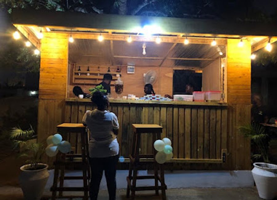 Experience the vibrant nightlife and delicious grilled cuisine at Tree Bar Ghana, a local favorite for food and fun in the heart of Accra.