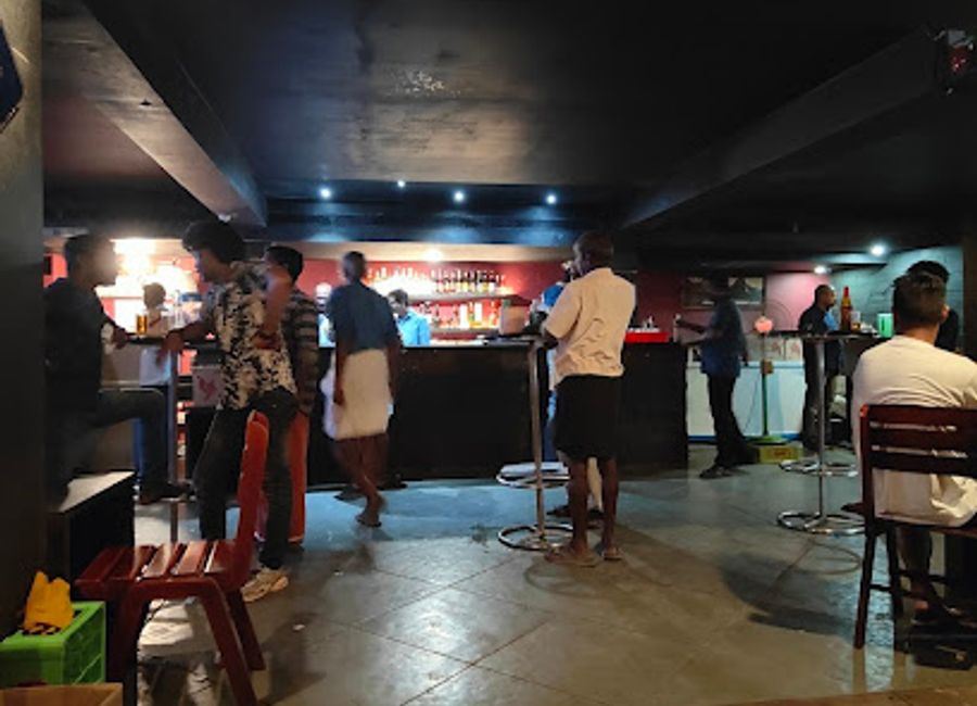 Experience the vibrant nightlife at Arcadia Bar in Alappuzha, where refreshing drinks and stunning sea views await.