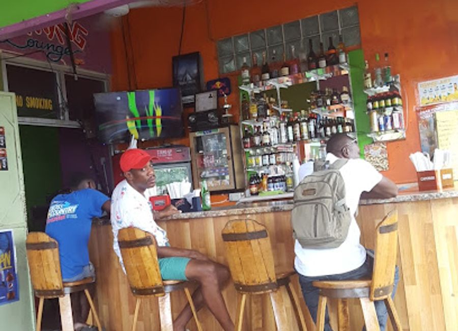 Experience the vibrant sports culture of Jamaica at Irie Vibes Sports Bar in Port Antonio, where every game is a celebration filled with local flavors.