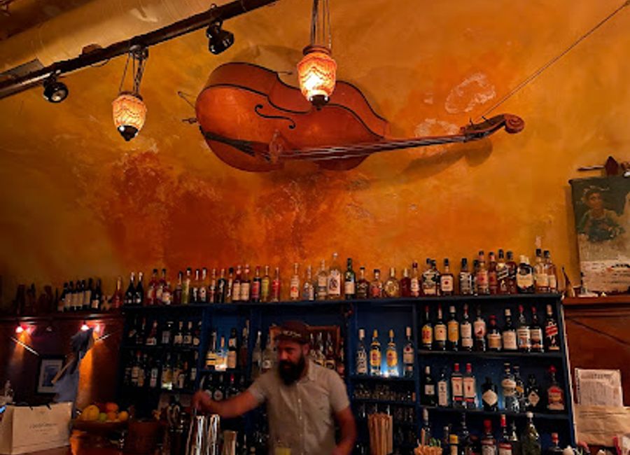 Experience the vibrant nightlife of Fira at Kira Thira Jazz Bar, where live jazz music meets exquisite cocktails and stunning views.