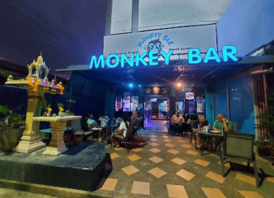 Experience the lively vibe at Monkey Bar/Restaurant Korat, where delicious food and refreshing drinks await in a vibrant atmosphere.