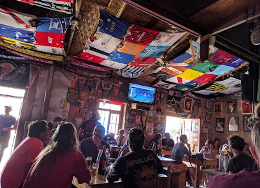 Discover the lively nightlife of ChelaCabur, a bar in San Pedro de Atacama offering local drinks and a vibrant atmosphere.