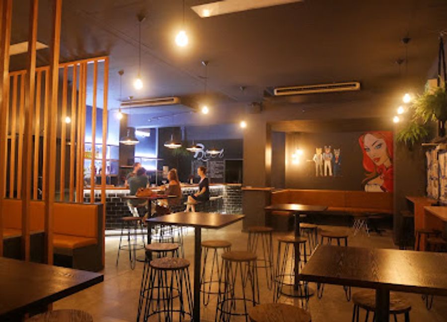 Experience the vibrant nightlife of Cairns City at Three Wolves, the ultimate cocktail bar with innovative drinks and a lively atmosphere.