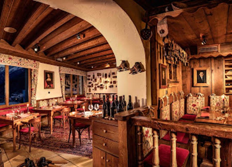 Experience the rich flavors of the Aosta Valley at Bar à Fromage, where local cheese takes center stage in a stunning mountain setting.