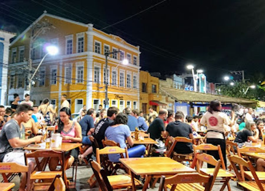 Discover the vibrant nightlife of Salvador at Rio Vermelho Bar, where eclectic drinks and live music create an unforgettable experience.