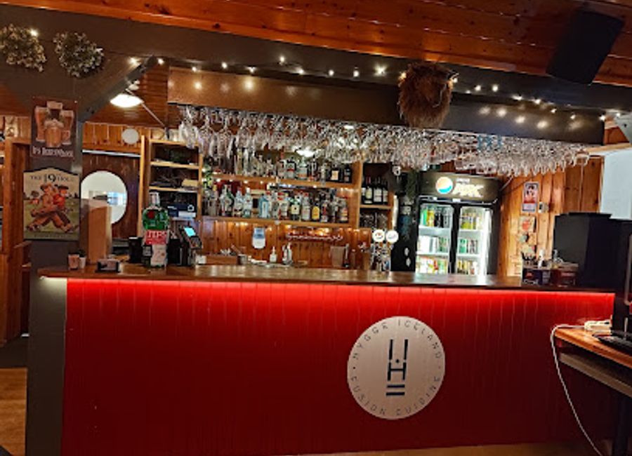 Experience the cozy charm of Hygge Restaurant & Bar, where Latin American flavors meet the freshness of Icelandic seafood for an unforgettable dining experience.