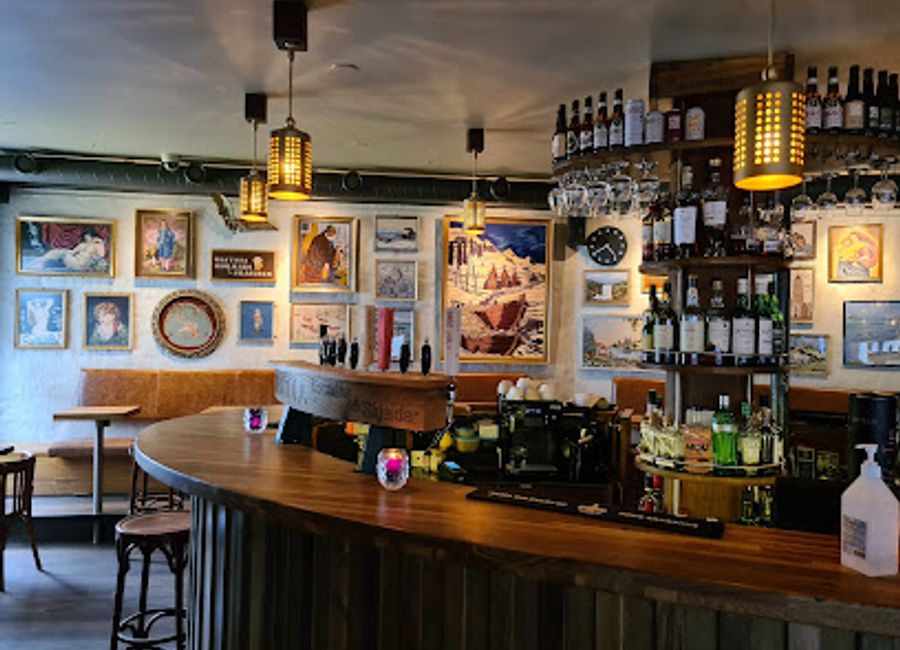 Discover the lively atmosphere of Ölstofa, Reykjavík's vibrant bar offering a taste of Icelandic culture and an impressive selection of local brews.