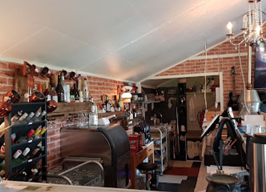 Experience the charm of Lofoten Pub in Sørland, where local flavors meet a warm atmosphere, perfect for relaxation and socializing.