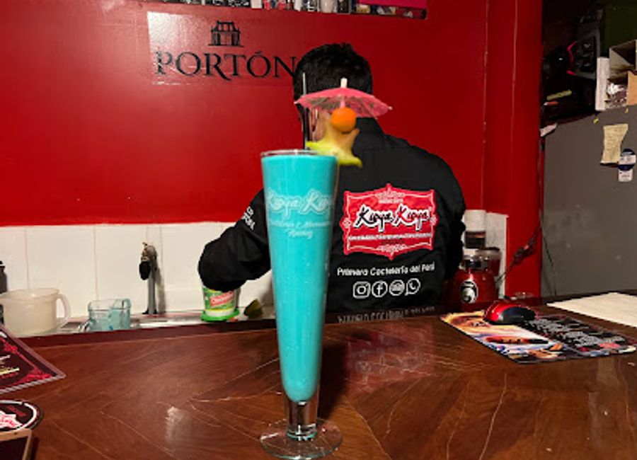 Discover the vibrant flavors of Peru at Kuya Kuya Coctelería Profesional Novoandina, where innovative cocktails meet a lively atmosphere.