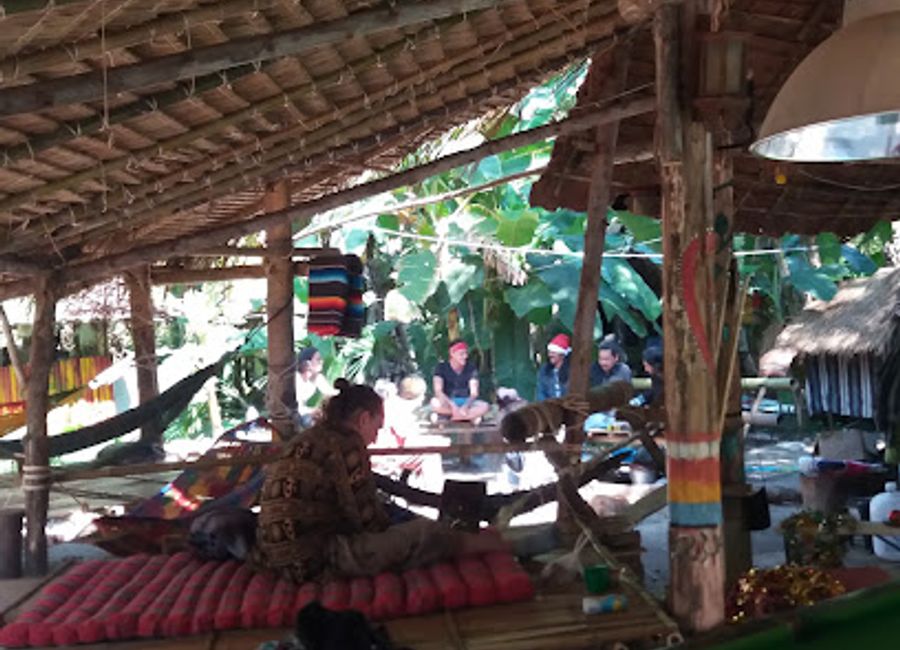 Discover the lively ambiance of Valhalla Bar in Pai, where local culture meets creative cocktails in a breathtaking setting.