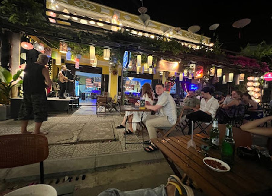 Discover the lively atmosphere of Wanderlust Hoi An, a bar offering exquisite cocktails and a unique blend of modern and traditional Vietnamese vibes.