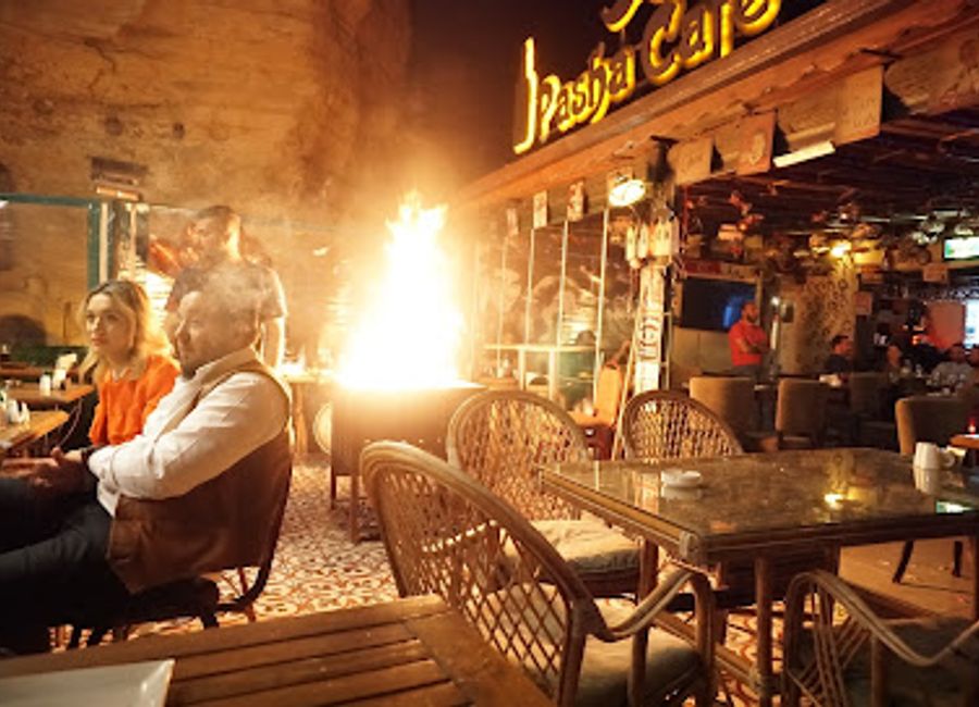 Discover a vibrant culinary experience at Pasha Cafe Bistro in Göreme, serving local and international delights amidst live music and a welcoming atmosphere.
