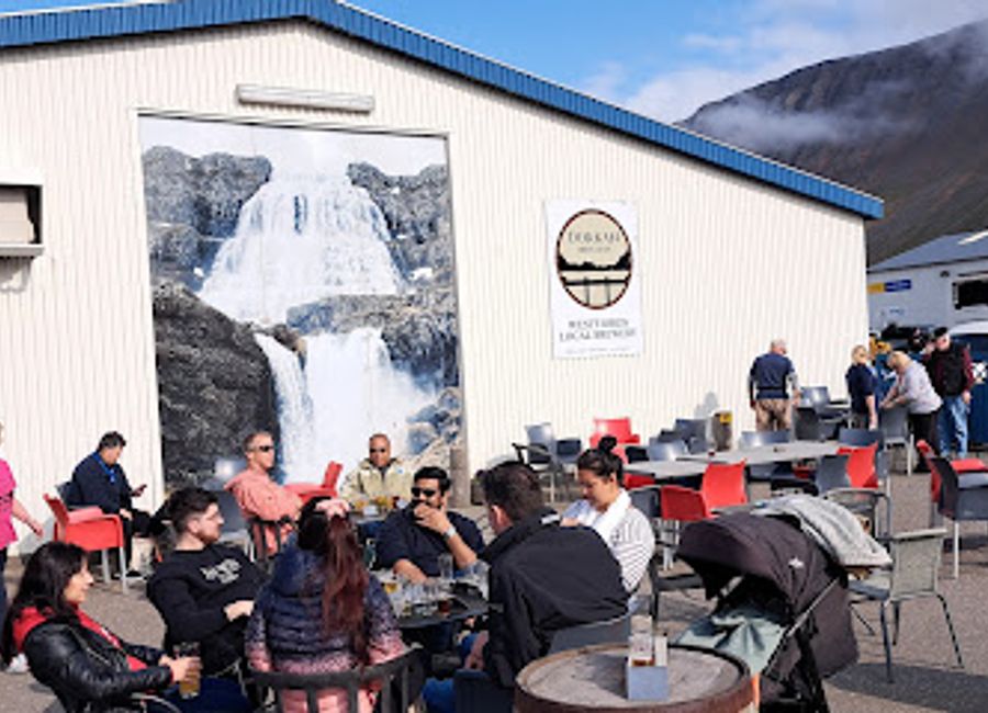 Discover the vibrant flavors of Iceland at Dokkan Brugghús, where craft beer meets exquisite local cuisine in a cozy atmosphere.