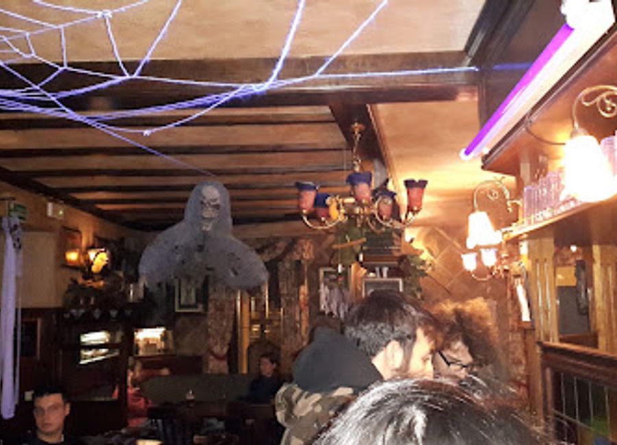Discover the lively atmosphere of Old Distillery, a must-visit pub in Aosta offering local brews and delicious snacks in a cozy setting.