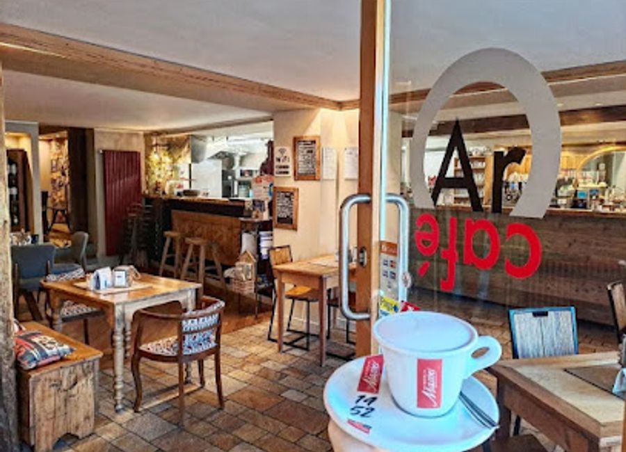 Discover the cozy charm of Café de l'Arc, a bar in Aosta offering local flavors and a welcoming atmosphere in the heart of the Aosta Valley.