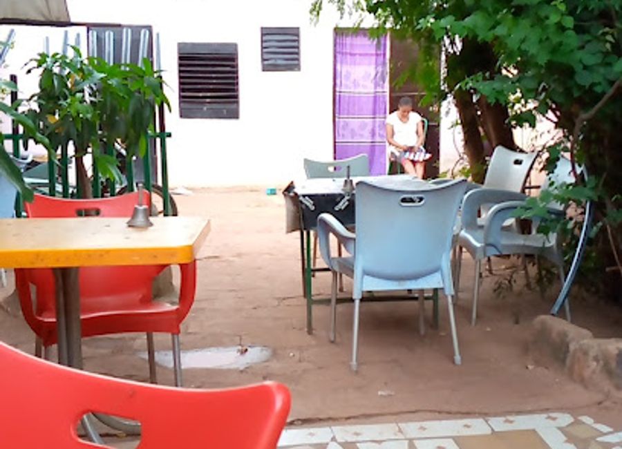 Experience the vibrant culture of Mali at Chez Lili, a cozy bar in Sévaré offering local drinks and a warm atmosphere for all travelers.