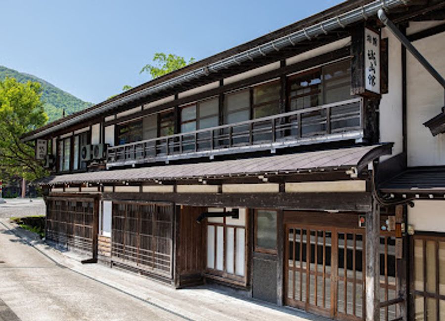 Experience the essence of Japan at Shiroyamakan, a traditional inn offering authentic cuisine and stunning views in Shirakawa.