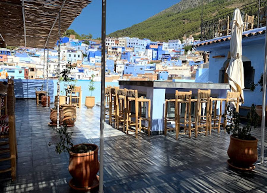 Discover authentic Moroccan cuisine and tea culture at Restaurant Hamsa in Chefchaouen, an inviting culinary oasis amidst stunning blue streets.