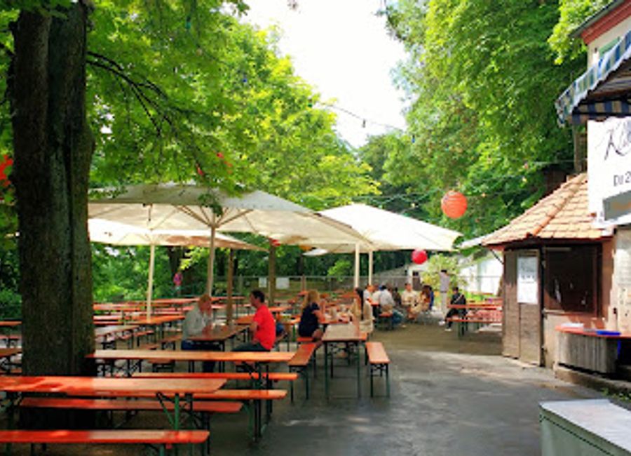 Experience the vibrant atmosphere of Entlas Cellar Beer Garden, where traditional Franconian cuisine meets refreshing local brews in Erlangen.