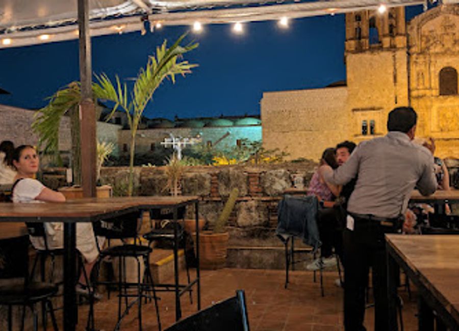 Experience the vibrant nightlife of Oaxaca at DESESTRESSE, a cocktail bar serving artisanal drinks and delicious bites in a lively atmosphere.