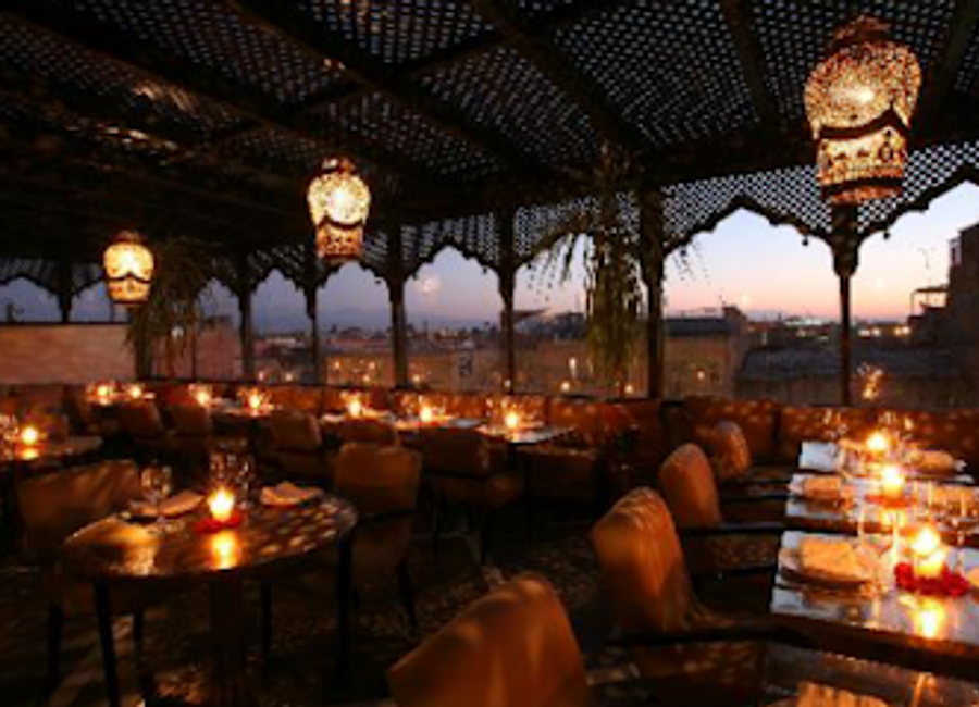 Discover the enchanting Le Salama Sky-bar in Marrakech, where stunning rooftop views meet exquisite Moroccan cuisine and vibrant nightlife.