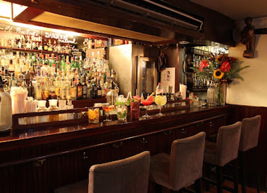 Discover the enchanting Caribbean Club cocktail bar in the heart of Barcelona's Ciutat Vella, where unique drinks and vibrant atmosphere await.