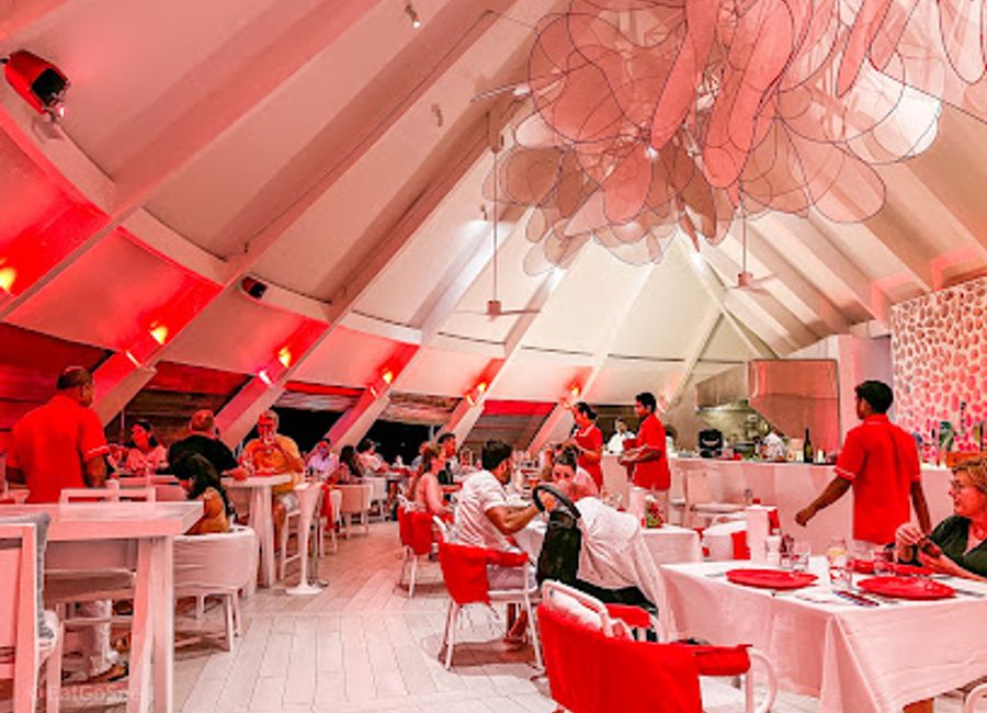 Discover the tranquil beauty of Beach Rouge in Dhidhdhoo, where vibrant beach life and stunning sunsets await every visitor.