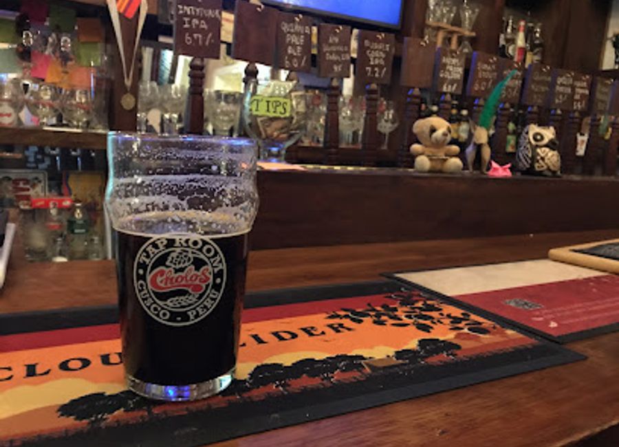 Experience the vibrant atmosphere and local flavors at Cholos Brewpub, a must-visit bar in the heart of Cusco's historic center.