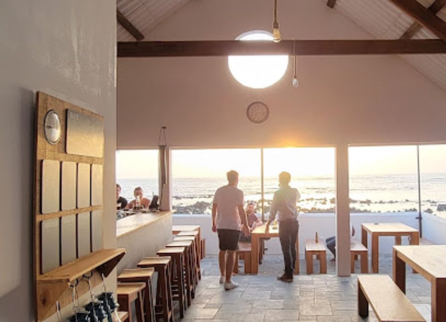 Discover Kraken Pub in Ngor, Dakar - where vibrant nightlife and local flavors come together for an unforgettable experience.