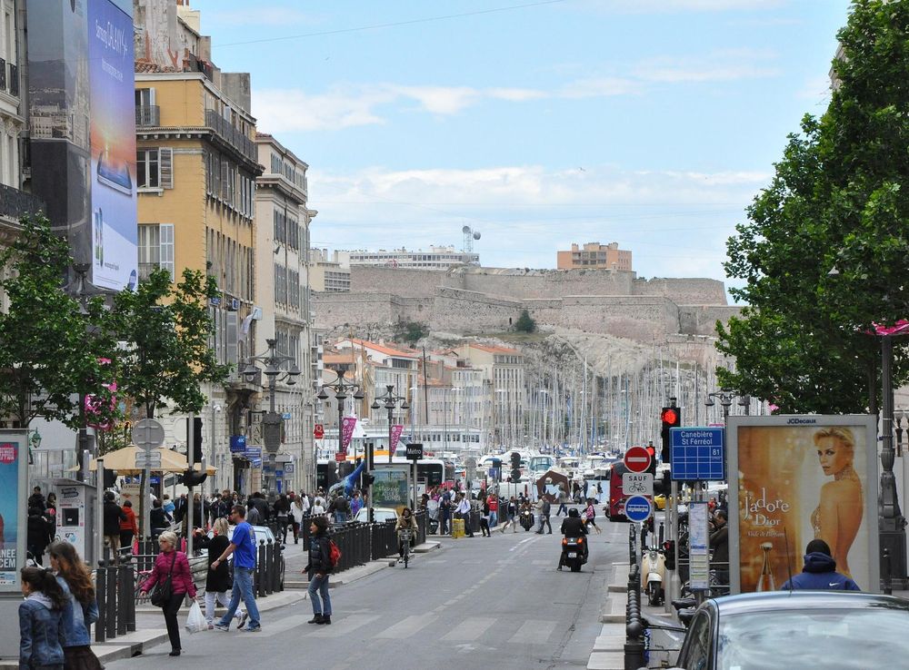 File:Marseille (France), Canebière and Fort Saint-Nicolas.JPG - Wikimedia  Commons