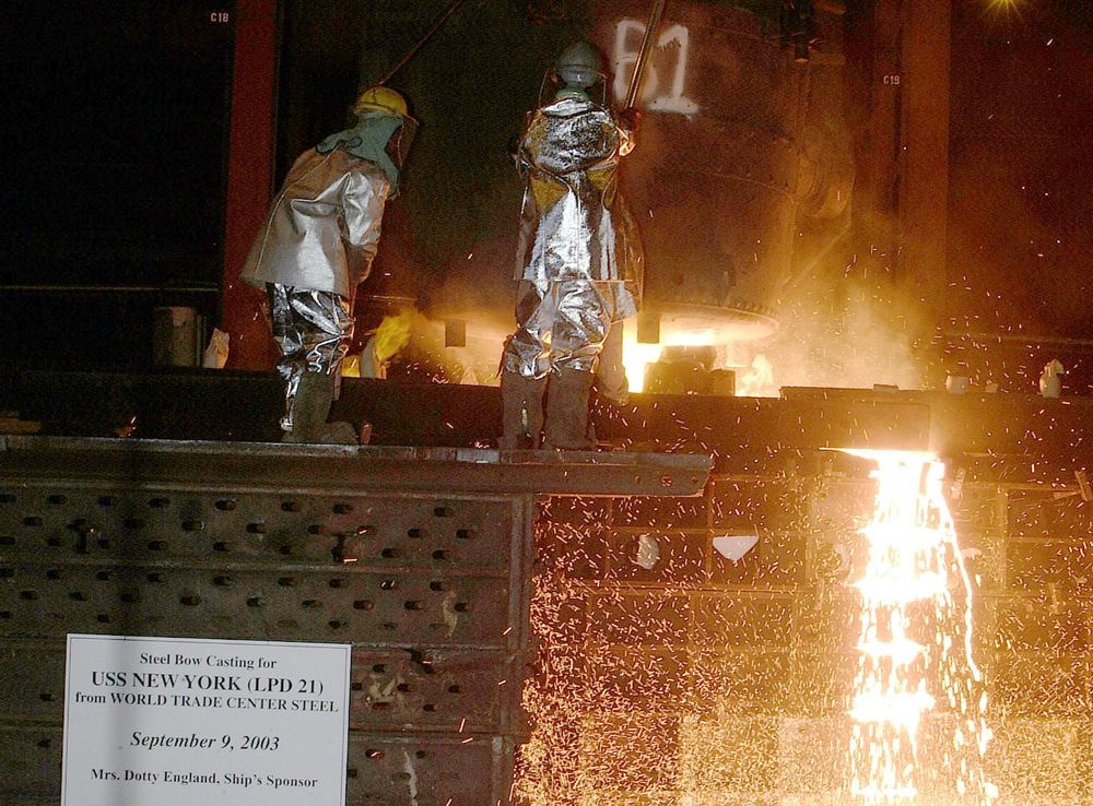 File:US Navy 030910-N-7542D-254 Workers from the Amite foundry pour molten  steel recycled