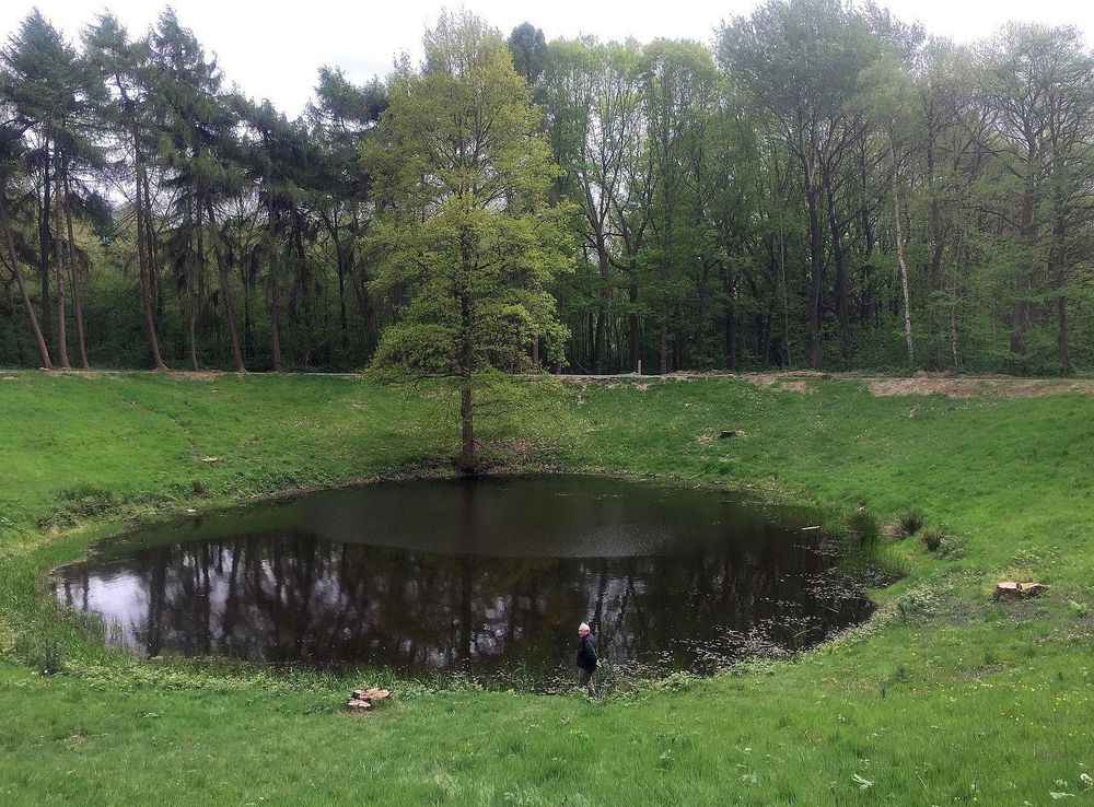 File:Hill 60 Ypres Belgium - 1917 deep mine crater Caterpillar1.JPG -  Wikimedia Commons