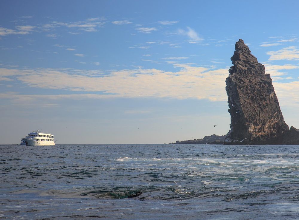 File:Final land excursion to Isla Bartomome and the lava beds on the E  coast of Isla San Salvadore - iconic Pinnacle rock on Isla Bartolome -  (16483842317).jpg - Wikimedia Commons